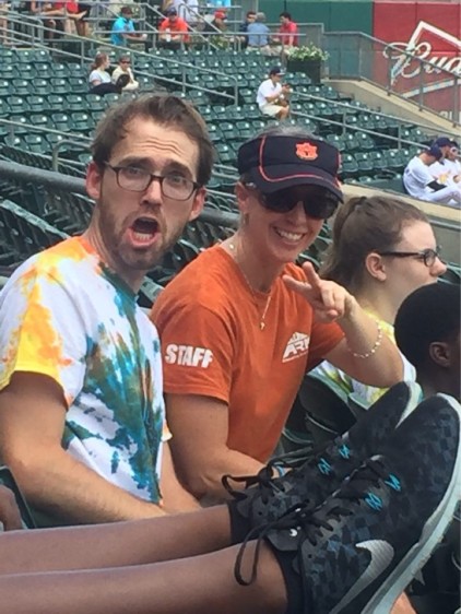 Lisa and Joe caught by surprise by the water at the game